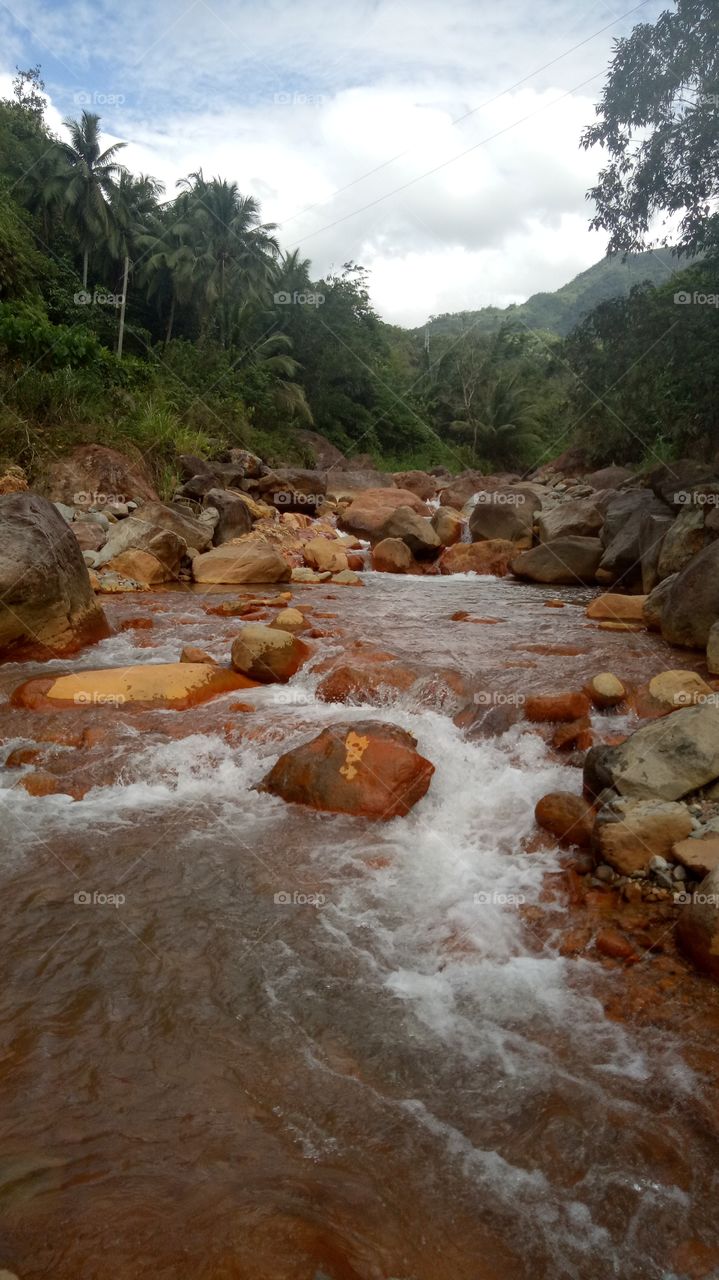 Amazing red rock river in Dumaguete City, Philippines