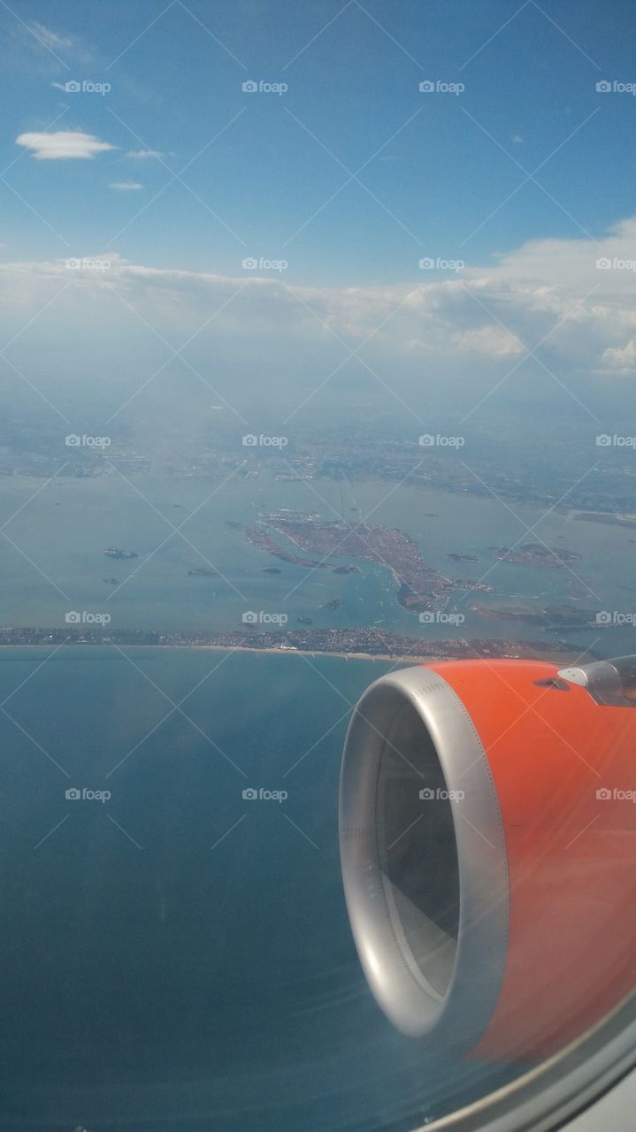 a Venice and its lagoon view from the sky