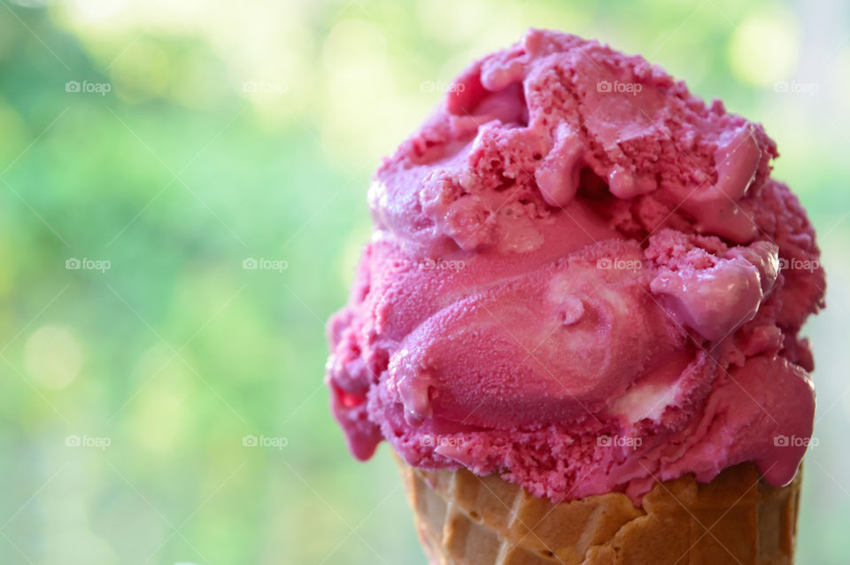 Close-up of pink ice cream cone