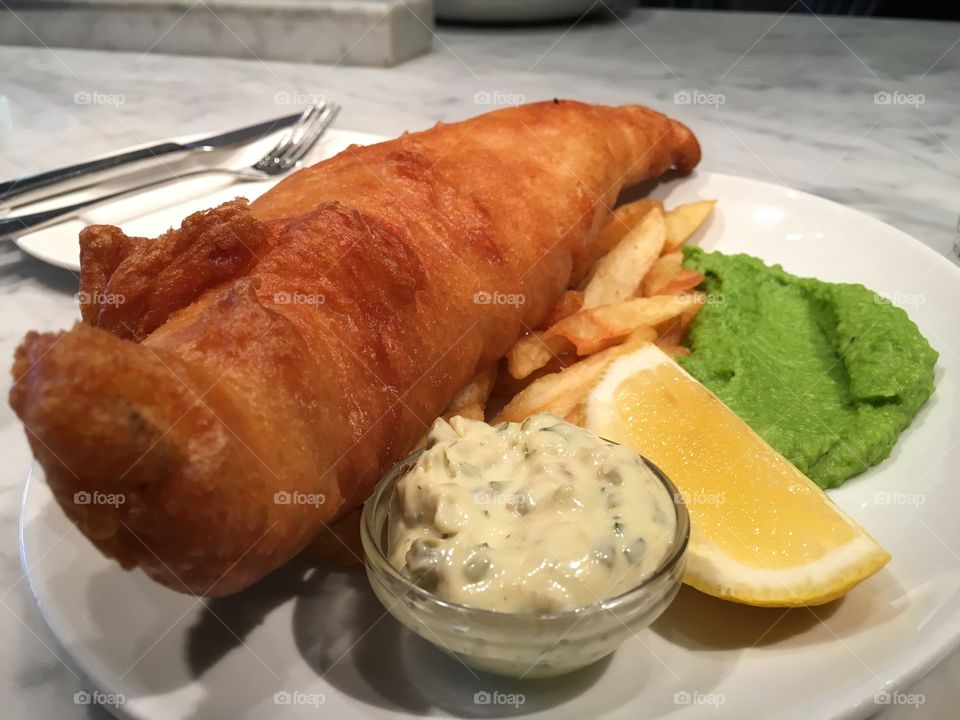 fish and chips with a slice of lemon 