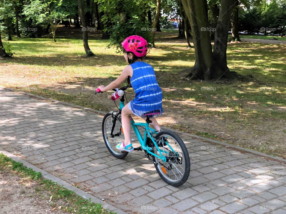 Little girl riding on bike