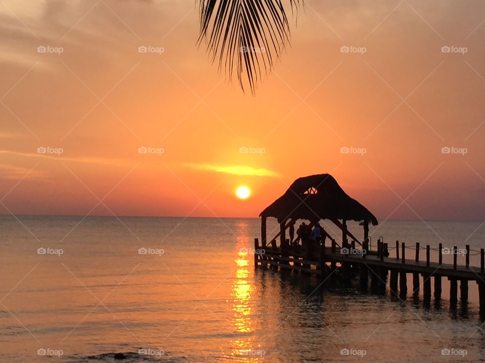 Romantic sunset on the beach of Cozumel