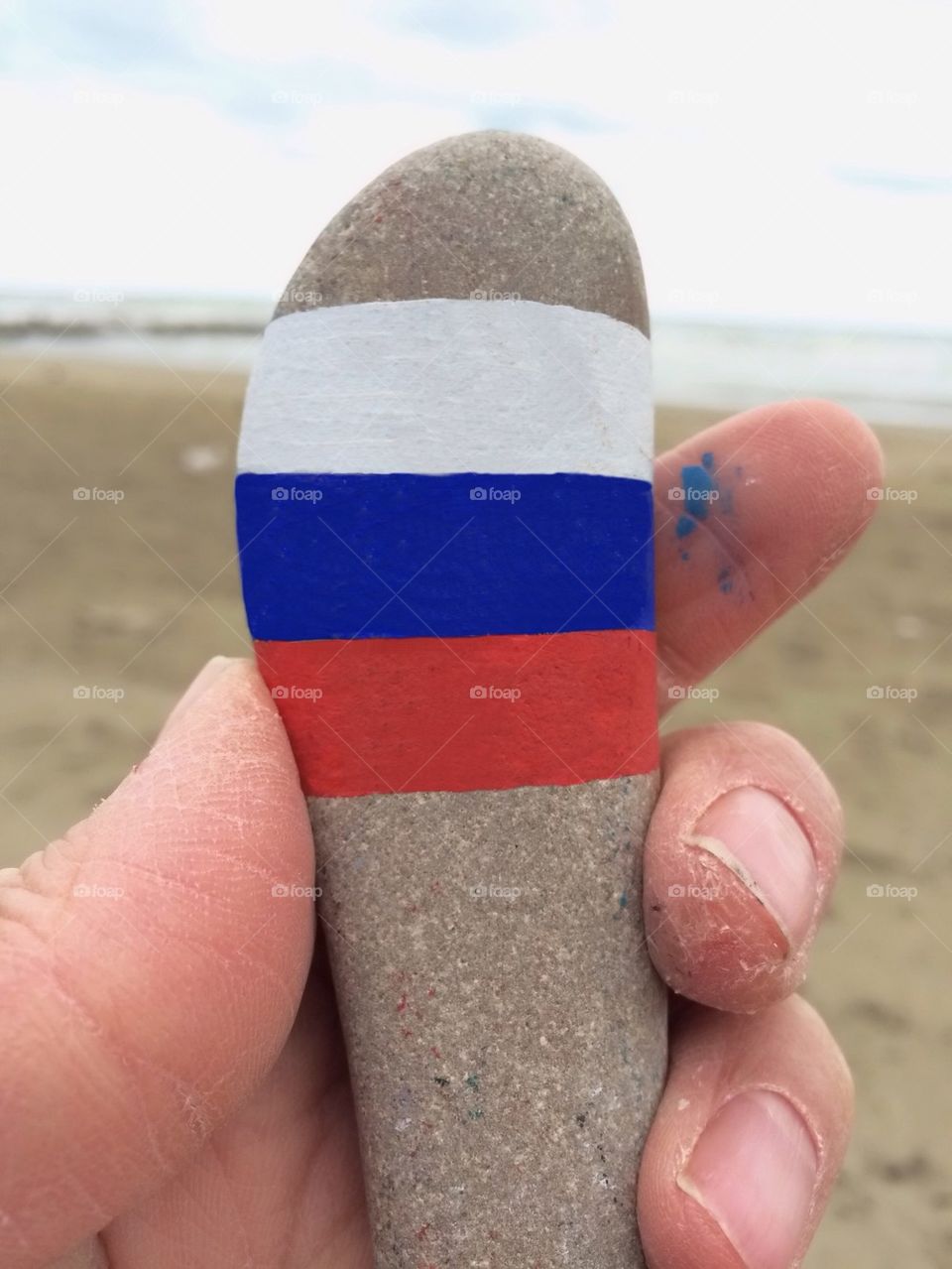 Russian flag on a palm hand