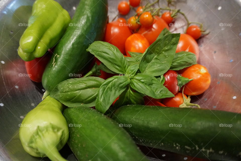 Overhead view of tomatoes and cucumber