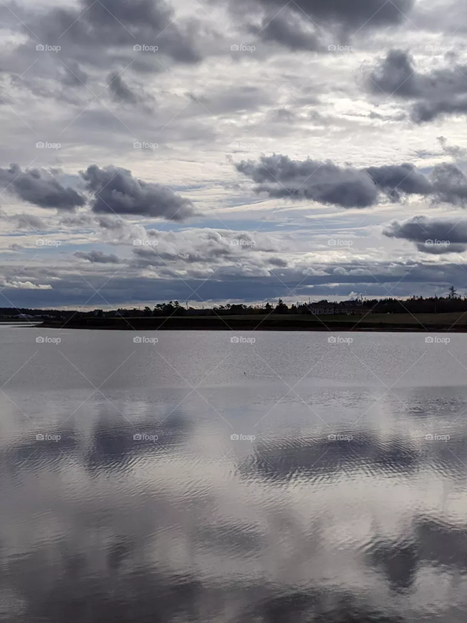 Dark sky and water.