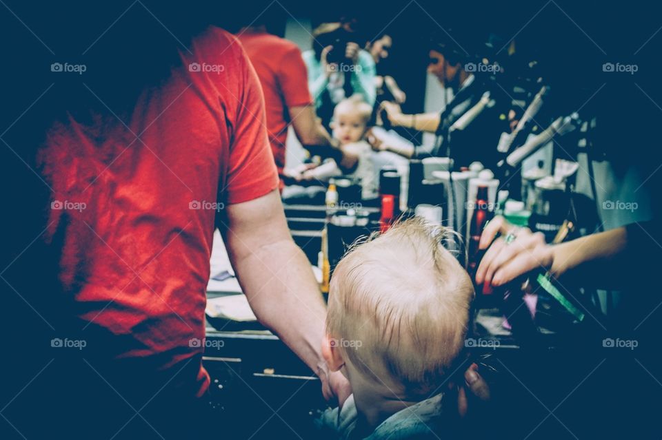 Finding yourself in the mirror through the chaos of your first haircut. 