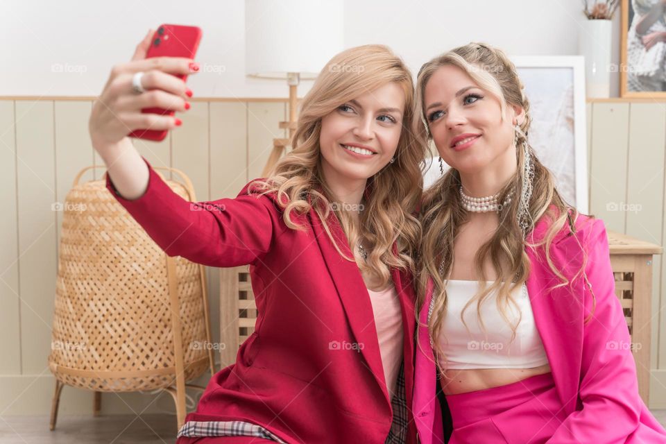 two girls with phone, selfie