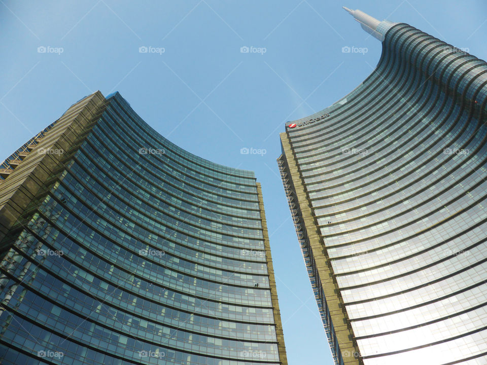 Looking up two skyscraper in the financial district of Milan,Italy