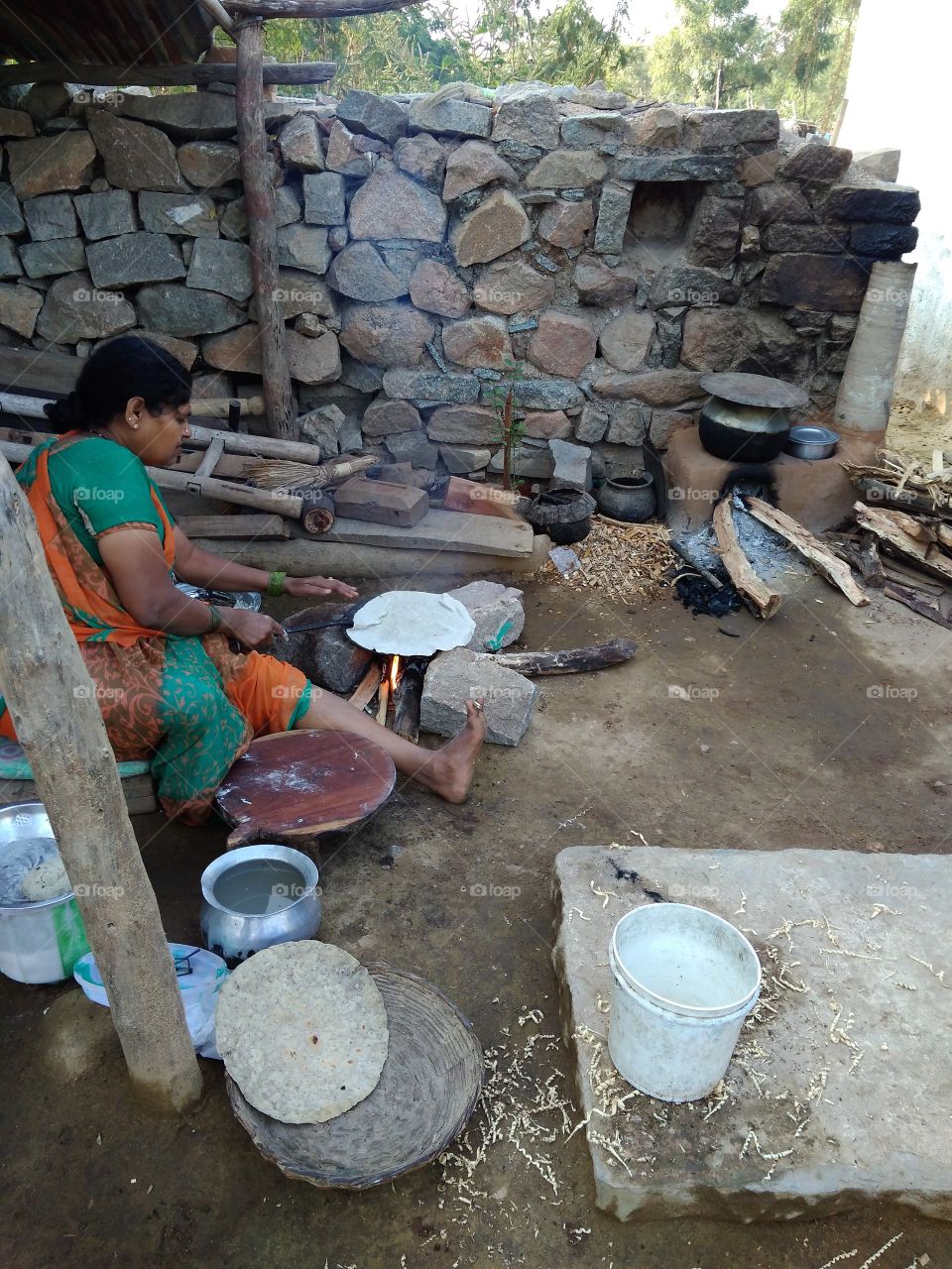 In my Grandma Village.My grandma is making Roties to eat on pongal occasion. Happy Sankranthi .