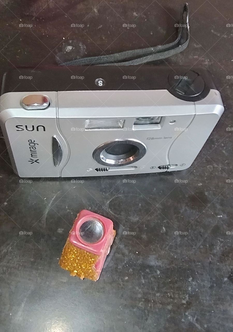 old camera and old photo in binoculars