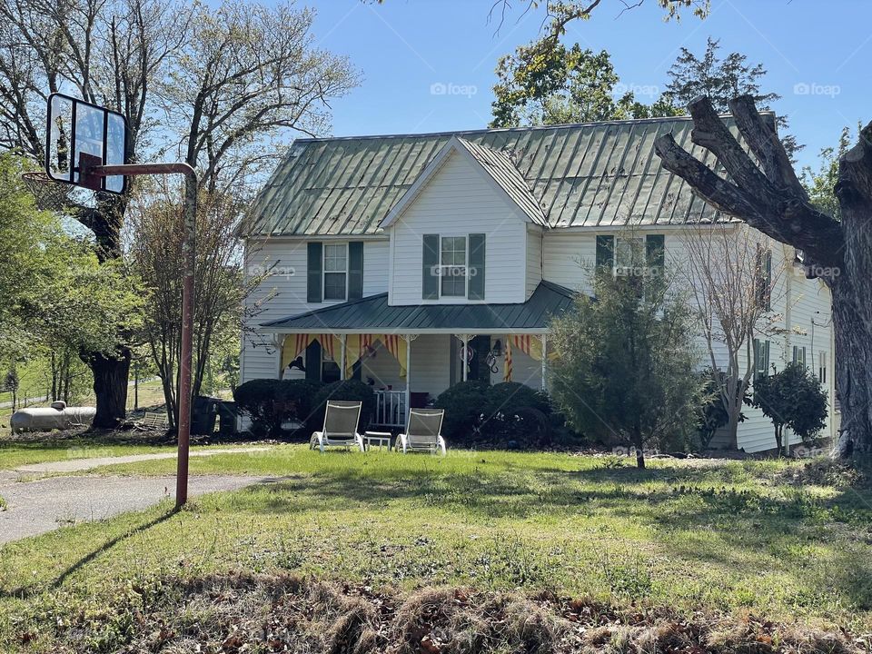 Old farmhouse with metal roof