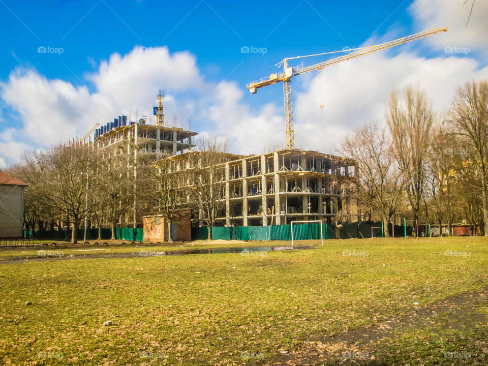 building process with crane on long exposure