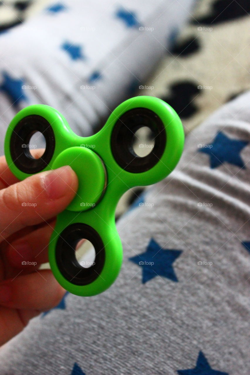 spinner in hand