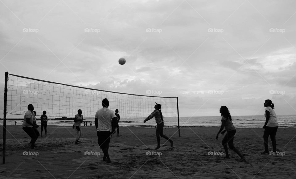 playing volleyball