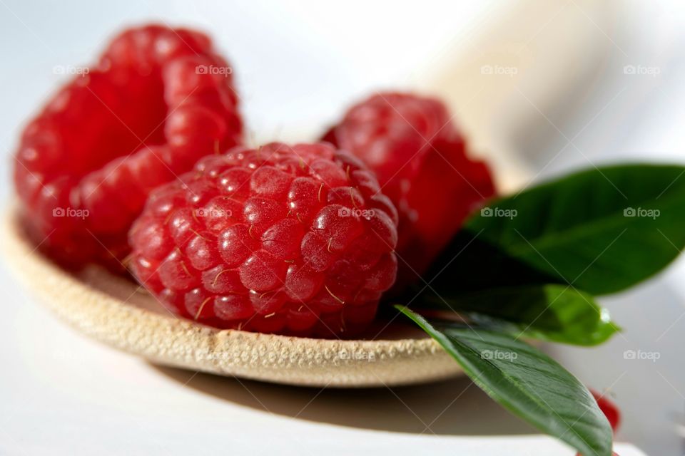 The power of three - three raspberries and 3 leaves