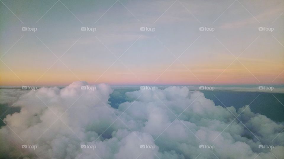  Clouds and skies beauty. Rainbow, blue, white, nature, light, wavy view from above.