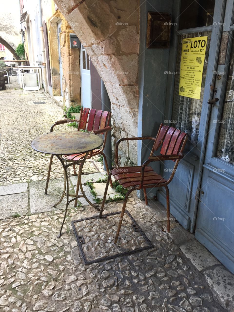 Seats outside a Cafe ,  Village in the Dordogne 