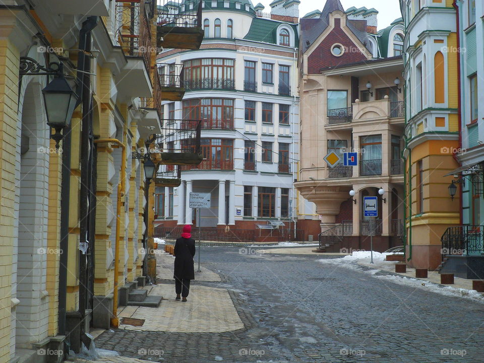 man talking on the empty street in the city of Kiev, Ukraine