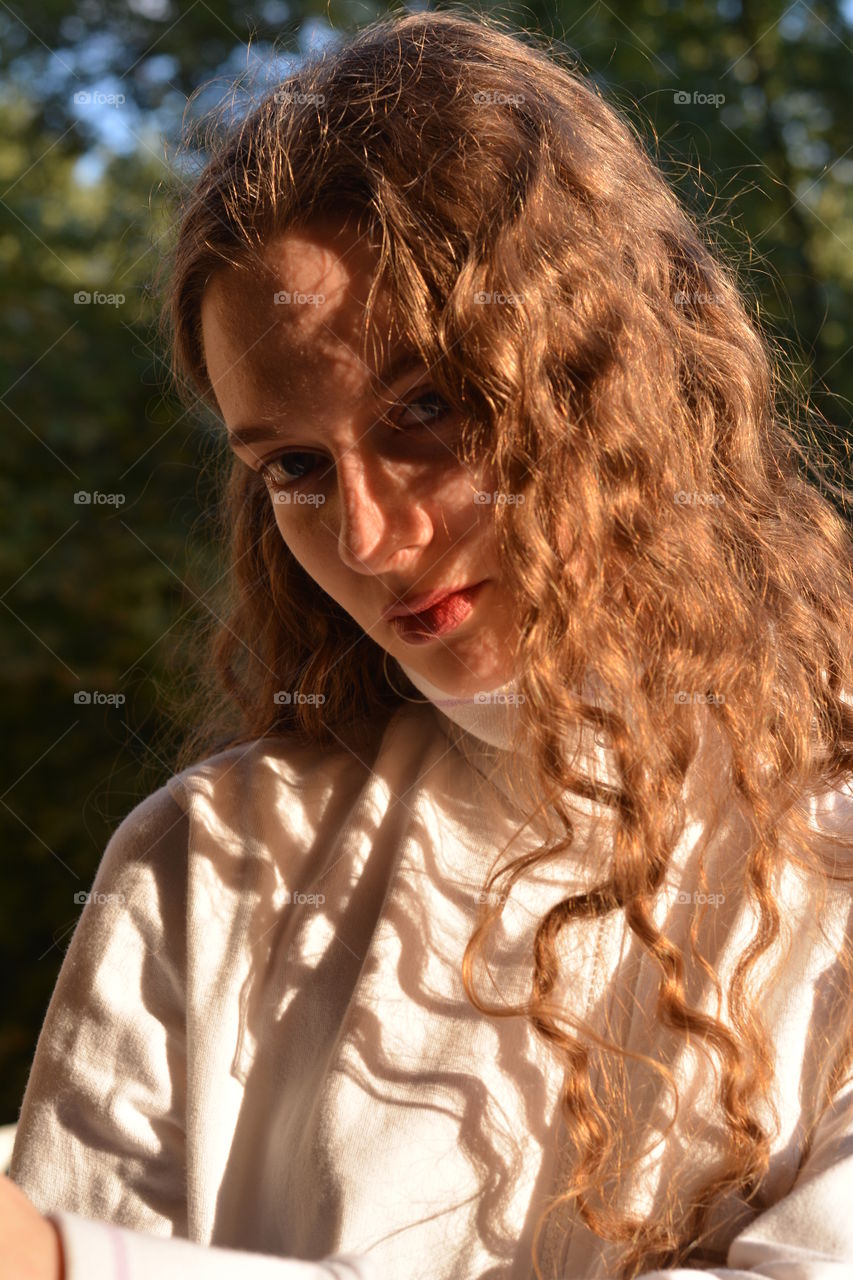 girl beautiful portrait close up in the sunlight