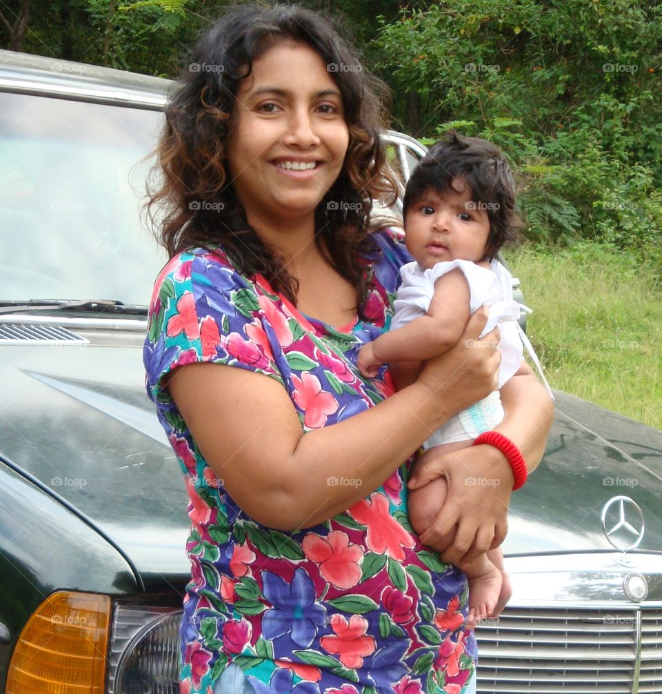 w123 240 d mercedes benz car and lovely mom and baby girl