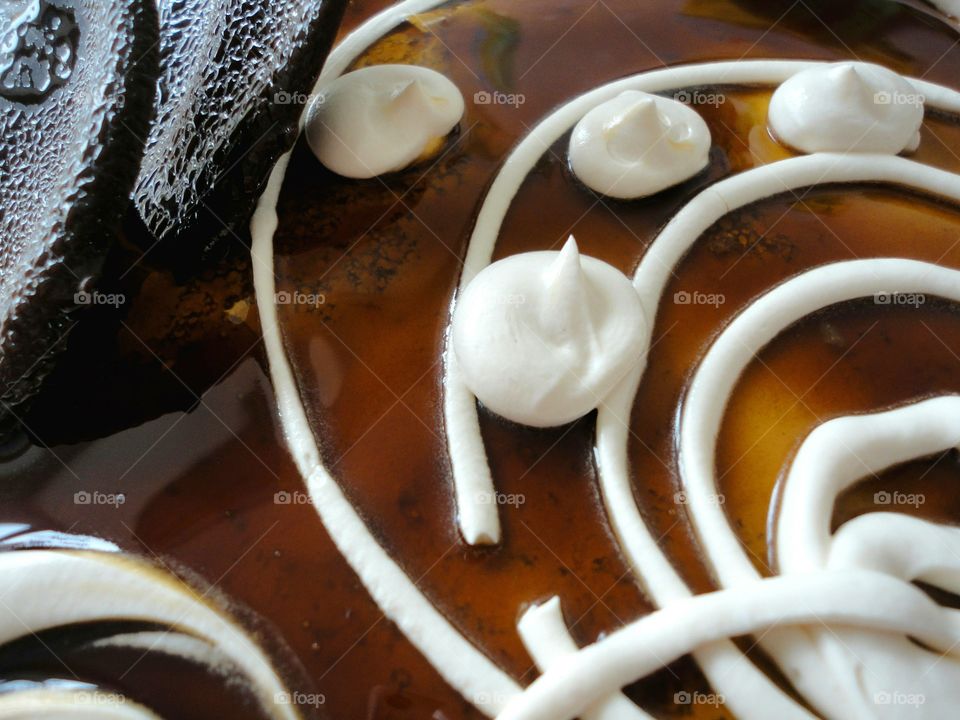 Close-up of whipped cream with caramel