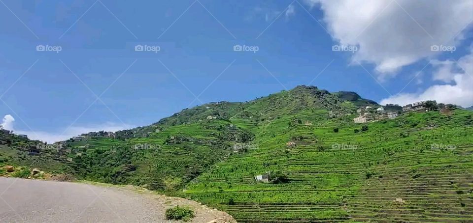 Glory be to God, the magnificent and picturesque view and the natural green trees are a view that is nothing more wonderful than it