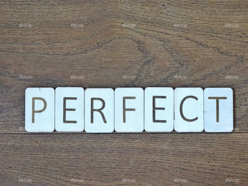 Perfect Spelled out with wooden letters.