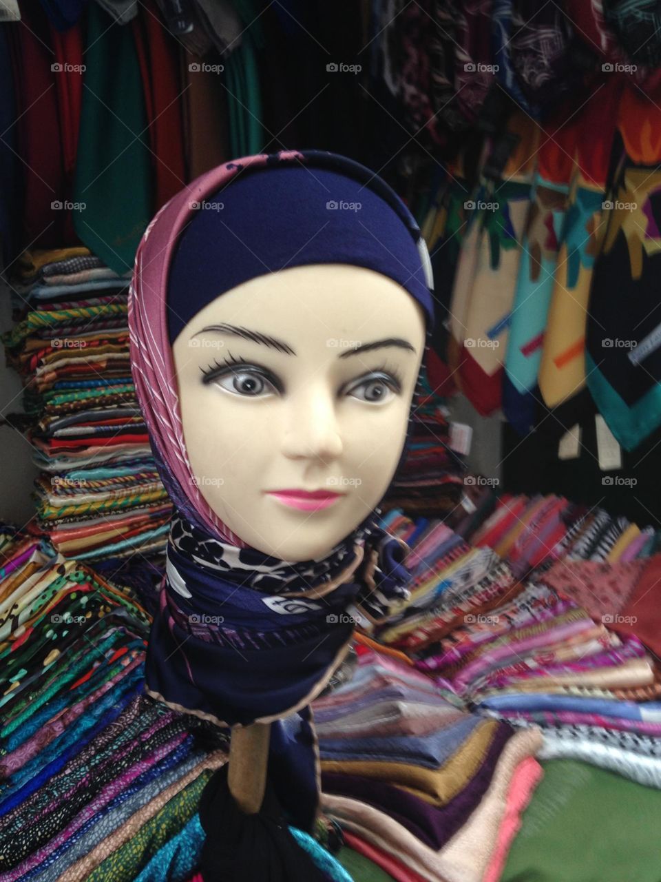 mannequin face with scarves in a market in Morocco