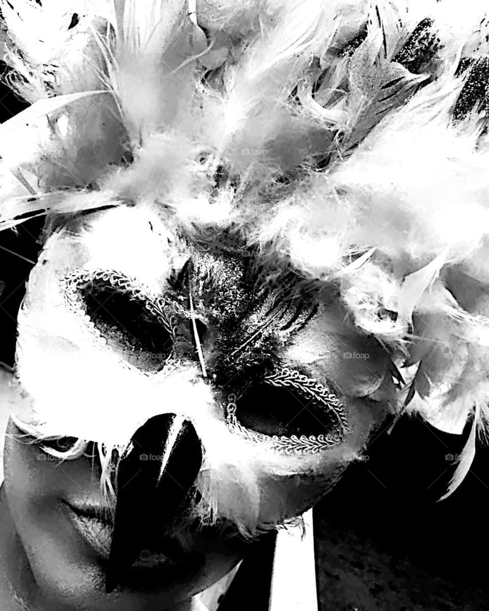 A little Mardi Gras costume made yours truly.  Turned out absolutely gorgeous. Wish I could fly away sometimes!