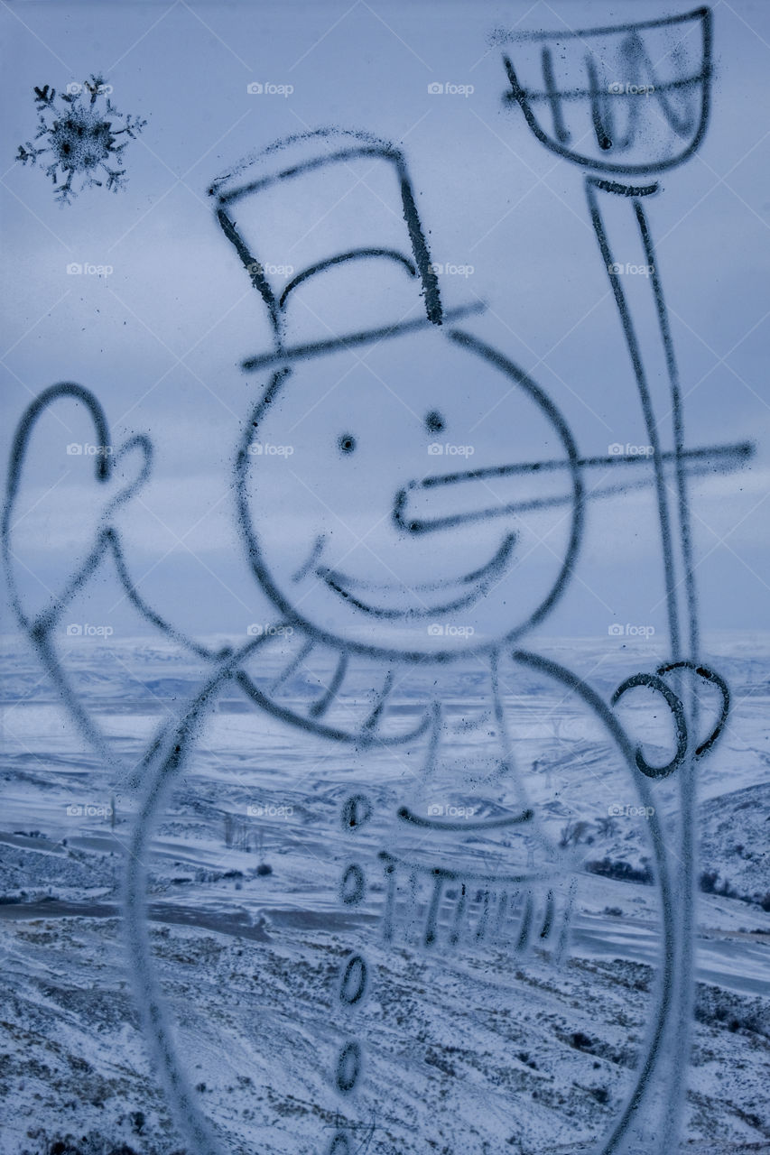 Snowman on a window