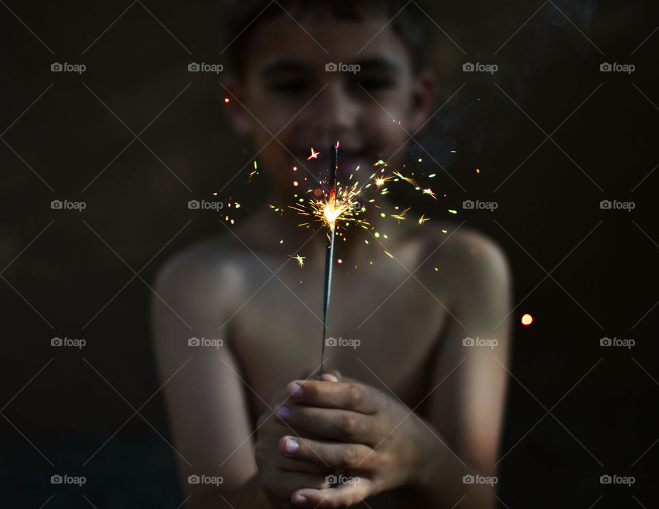 Sparkle . Boy with sparkler 