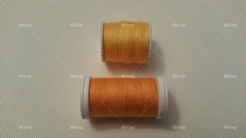 Spool of yellow thread