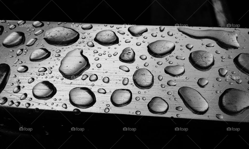 Water drops on the metal