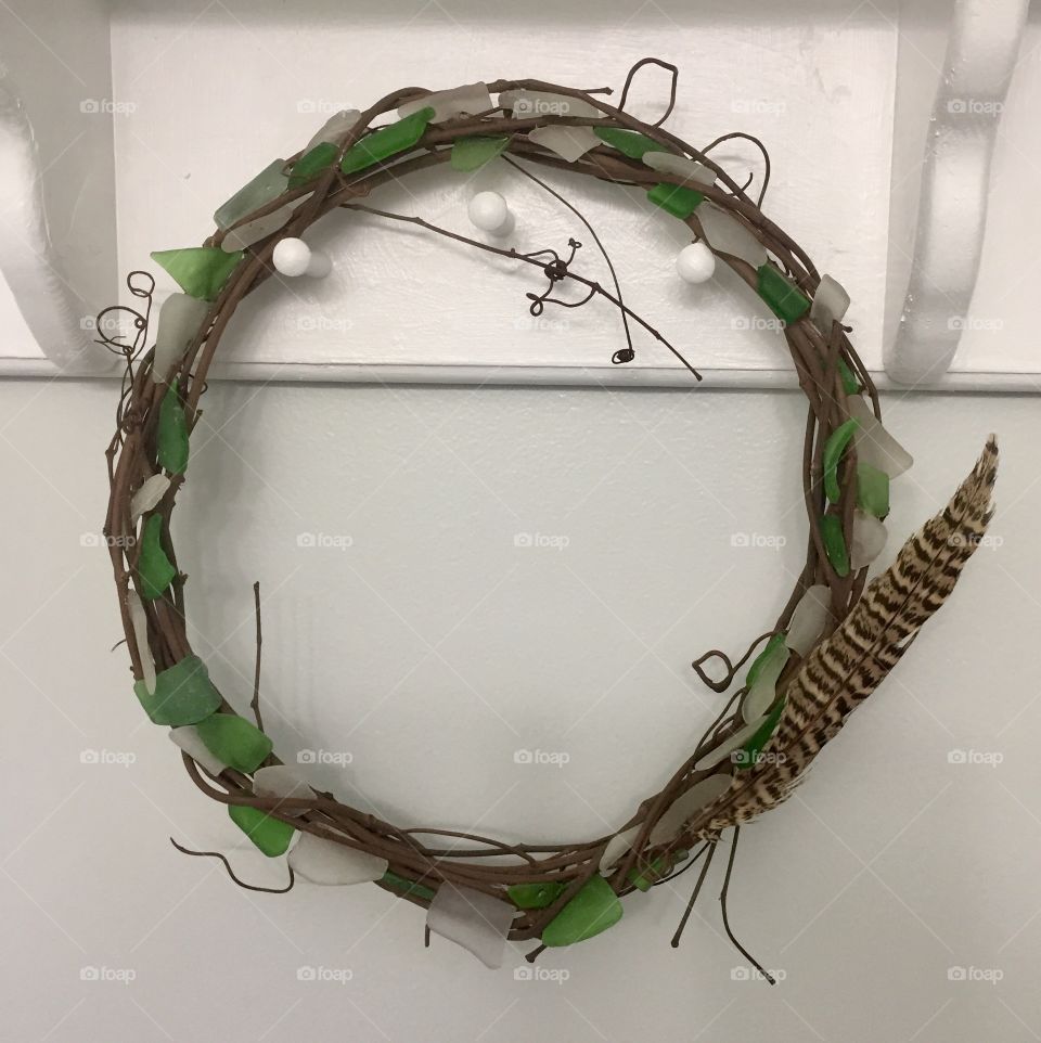 Seaglass wreath with feather