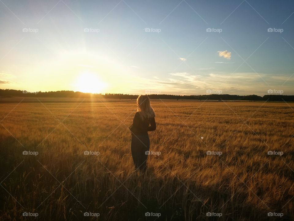 pic of me on a summer night standing in a field.