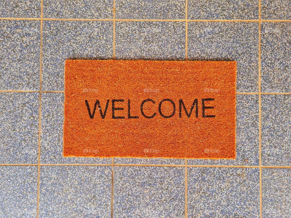 doormat with welcome inscription