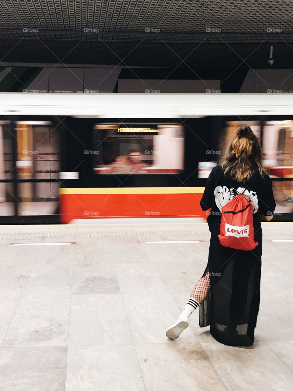 Girl waiting for subway 