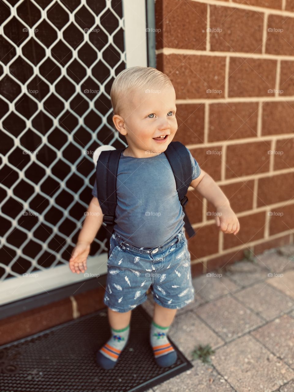 Boy heading off for first day of daycare