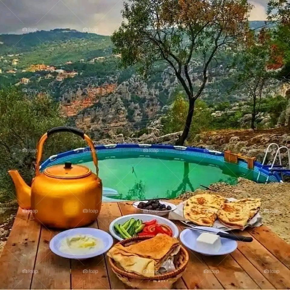 Glory be to God, the magnificent and picturesque view and the natural green trees are a view that is nothing more wonderful than it