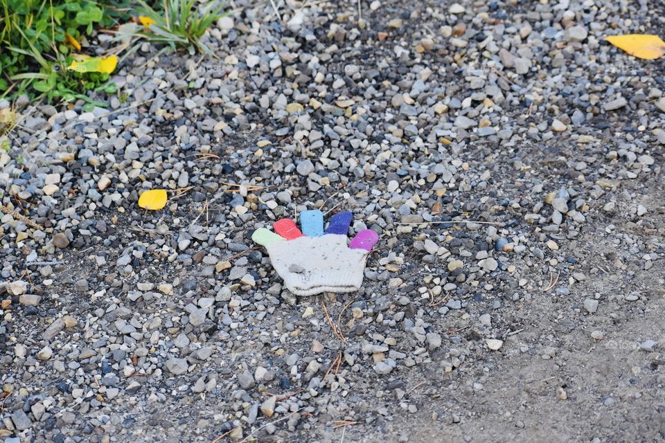 Glove on the path in the fall 