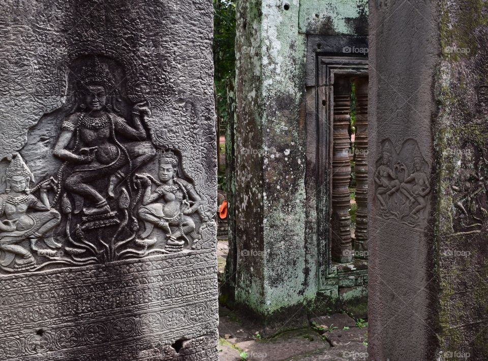Ancient walls of Angkor Wat . Old figures in the walls of Angkor Wat (Cambodia)