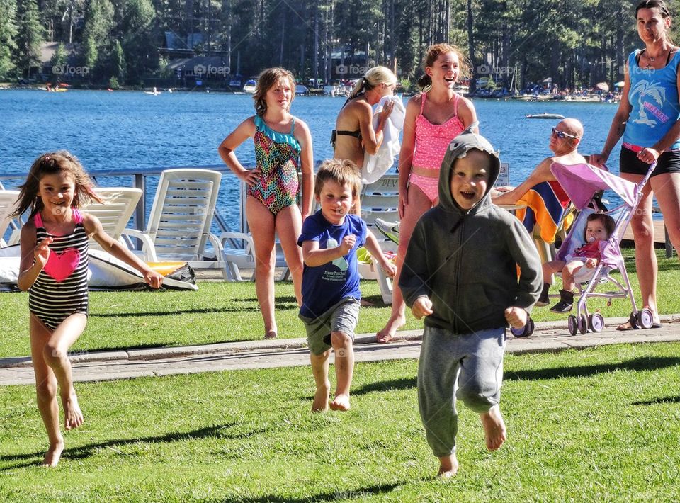 Boys And Girls In A Beach Foot Race. Healthy Children