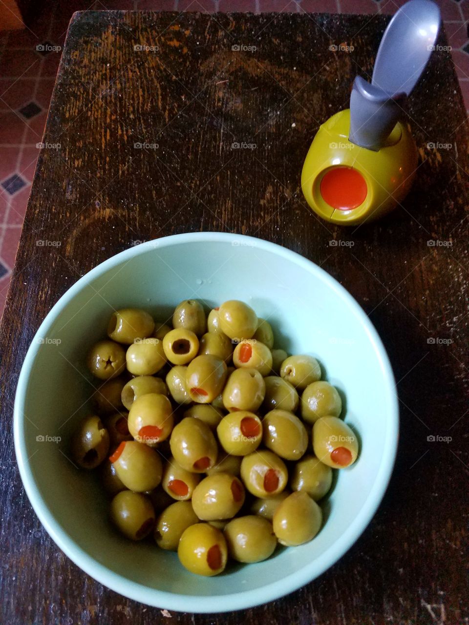 Green Olives, pimentos & Green Olive Pepper Mill. Things that look alike.