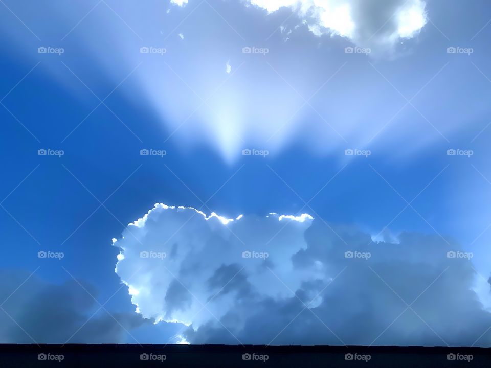 Unusual cloudscape in a bright blue sunset.