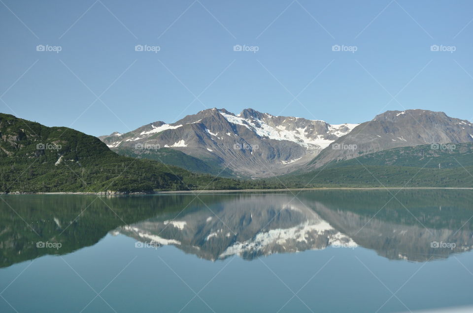 Mountain reflected on river