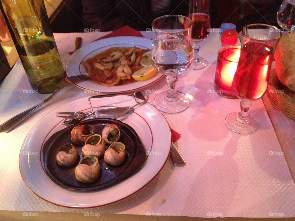 Dinner with  wine, snails and frogs legs 