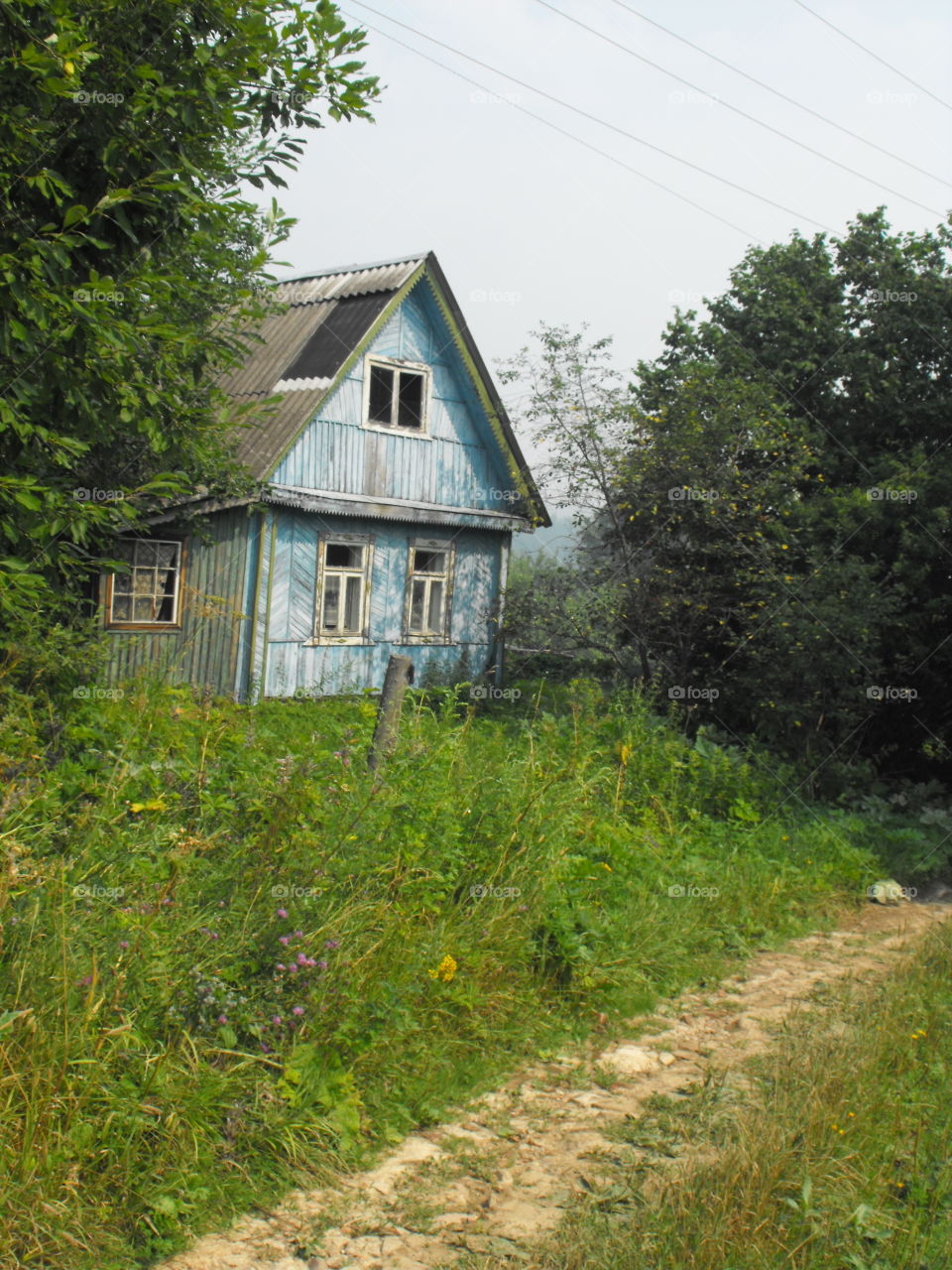An old blue summer cottage in Russia