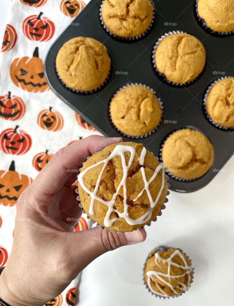 Eating delicious pumpkin cinnamon muffins, muffins hot from the oven, focused on muffins, baking at home with toddlers 