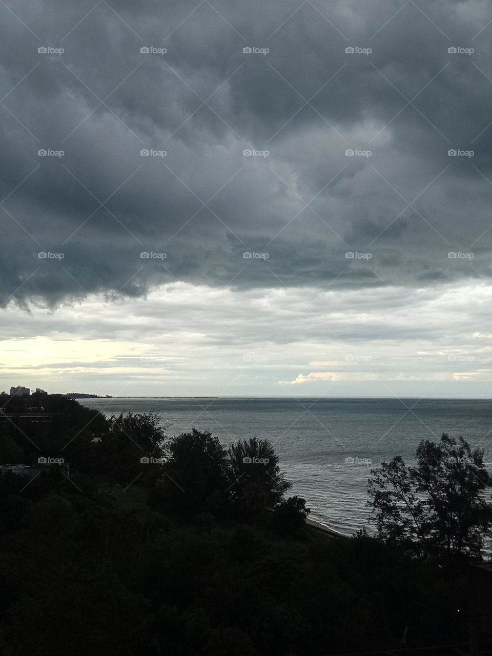 Low level storm cloud over the beach