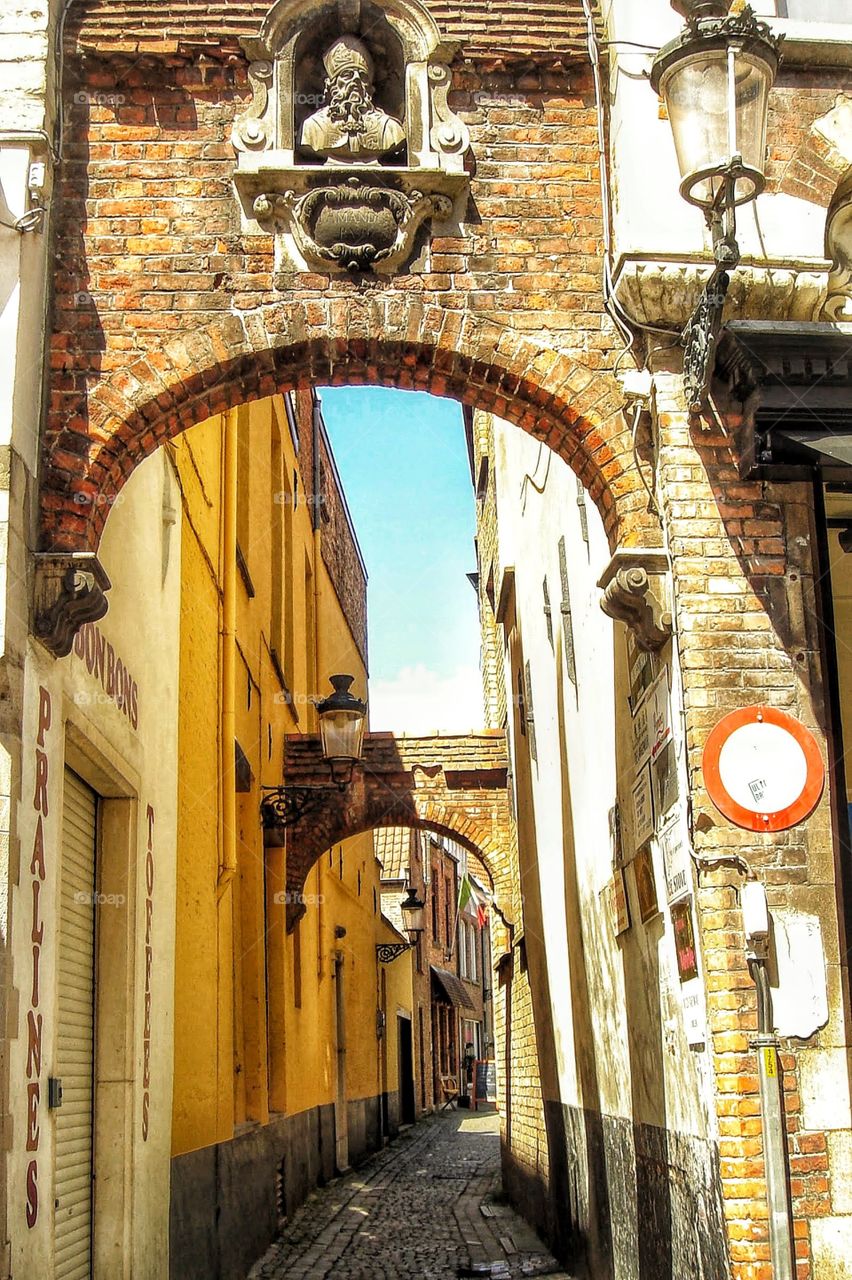 Alley in quaint, medieval Bruges
